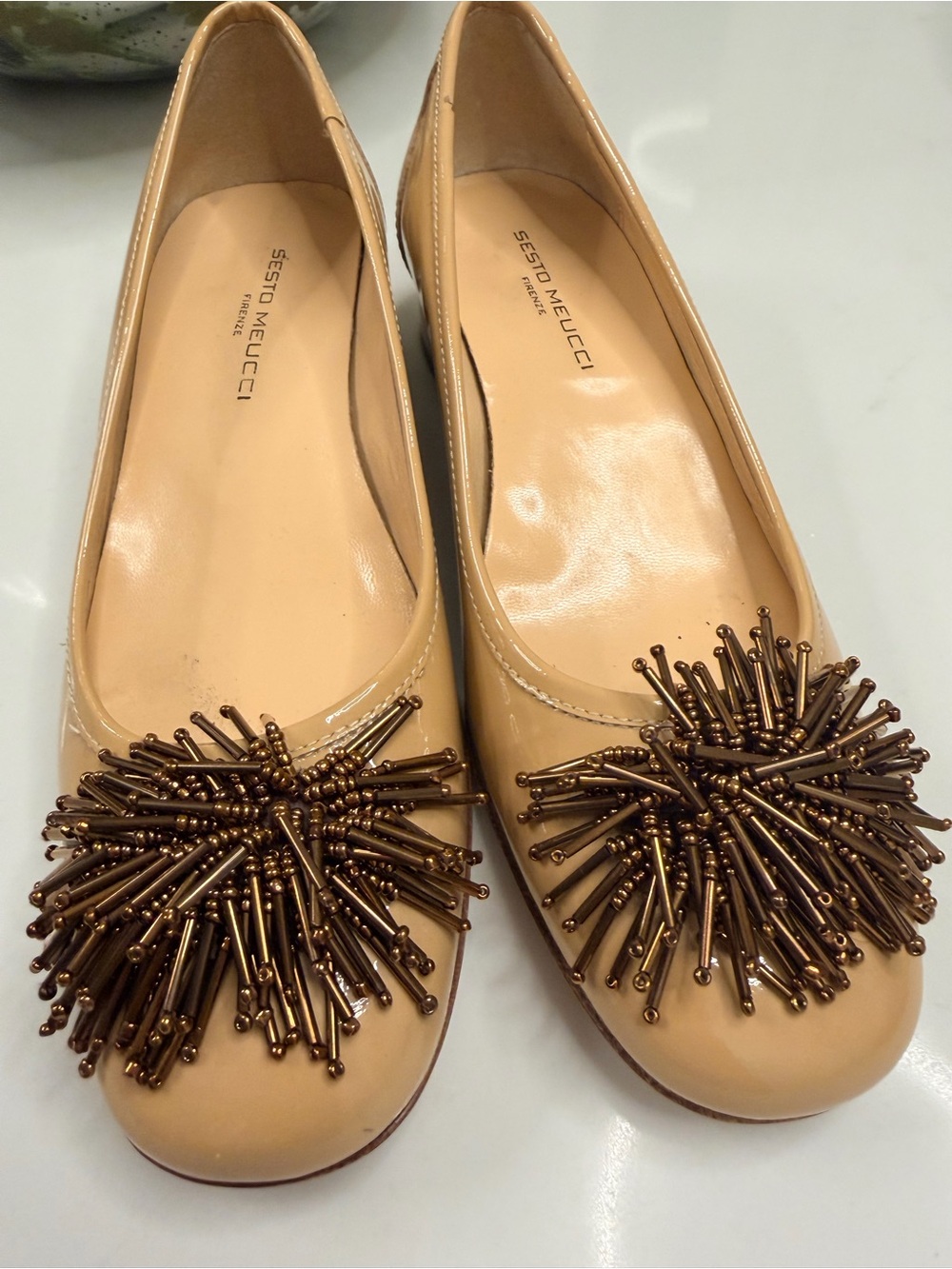 Sesto Meucci Nude Patent leather pumps  with Bronze Bead Pom-Poms